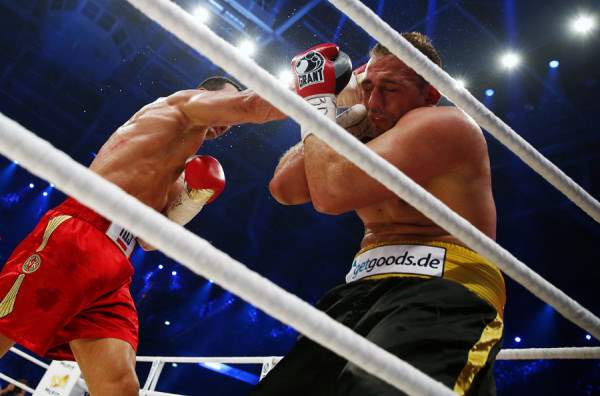Heavyweight boxing world champion Klitschko lands a punch on Pianeta in Mannheim