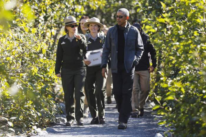 U.S. President Barack Obama hikes with National Park Service staffs to the Exit Glacier at Kenai Fjords National Park in Seward, Alaska, September 1, 2015. President Barack Obama on Tuesday proposed a faster timetable for buying a new heavy icebreaker for the U.S. Arctic, where quickly melting sea ice has spurred more maritime traffic and the United States has fallen far behind Russian resources. REUTERS/Jonathan Ernst?