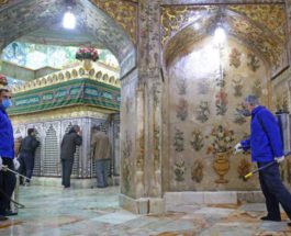 Иранские рабочие дезинфицируют храм Масуме